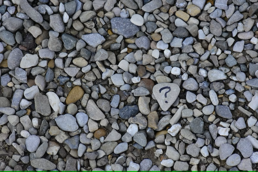 pebbles and question mark